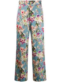 Junya Watanabe расклешенные брюки с цветочным принтом