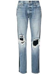 Khaite джинсы с эффектом потертости