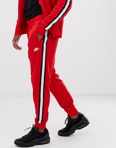 Красные спортивные джоггеры Nike Tribute