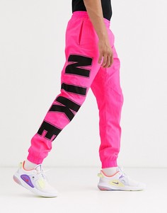 Розовые джоггеры Nike