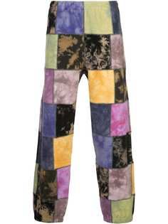 Supreme patchwork tie-dye trousers
