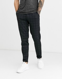 Темно-серые брюки в клетку Celio