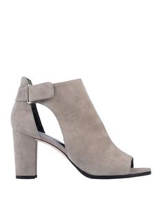 Полусапоги и высокие ботинки Stuart Weitzman