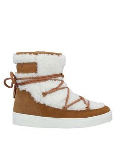 Полусапоги и высокие ботинки Moon Boot