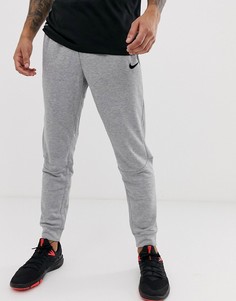 Серые суженные книзу джоггеры из быстросохнущей ткани Dri-Fit Nike Training-Серый