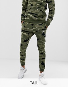 Зеленые джоггеры с камуфляжным принтом Nike Tall Club AJ2111-325-Зеленый
