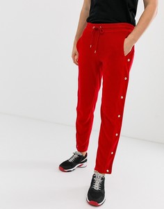 Красные велюровые зауженные джоггеры с отделкой и кнопками по бокам ASOS DESIGN-Красный