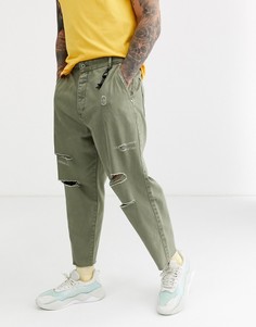 Свободные джинсы-морковки цвета хаки с рваной отделкой Bershka-Зеленый