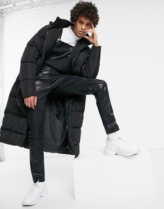 Черный комбинезон скинни из искусственной кожи ASOS DESIGN