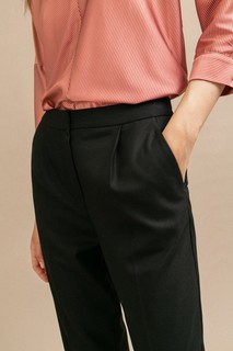 Брюки с защипами Emka