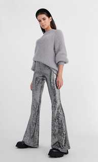 Брюки клеш с металлизированной отделкой Stradivarius