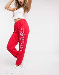 Красные спортивные брюки с вертикальным логотипом Juicy couture-Красный