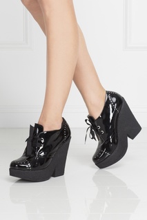 Ботильоны из лакированной кожи Carven