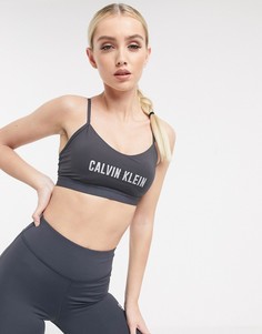 Серый спортивный бюстгальтер со светоотражающим логотипом Calvin Klein Performance