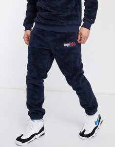 Темно-синие флисовые джоггеры с манжетами и логотипом Tommy Jeans-Темно-синий