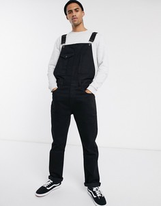 Черный джинсовый комбинезон с передним карманом ASOS DESIGN