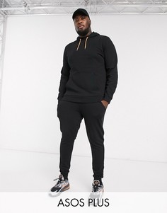 Черный спортивный костюм с ярко-оранжевыми завязками ASOS DESIGN Plus