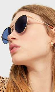 Круглые солнечные очки в металлической оправе Stradivarius