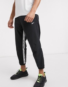 Черные джоггеры с отделкой лентой Reebok Training-Черный