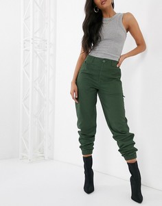 Брюки хаки с кромкой манжетом ASOS DESIGN-Зеленый цвет