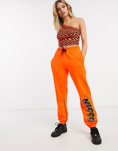 Свободные спортивные штаны с контрастным логотипом Nicce-Оранжевый
