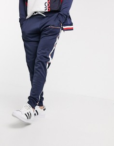 Спортивные брюки с манжетами и полосами по бокам Tommy Hilfiger-Темно-синий