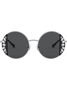 Miu Miu Eyewear солнцезащитные очки Noir в круглой оправе