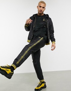 Черные спортивные брюки с золотистой лентой Fila-Черный