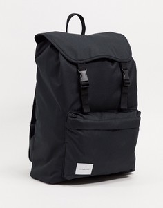 Черный рюкзак с белой фирменной нашивкой и двумя ремешками ASOS DESIGN