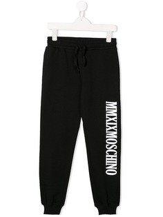 Moschino Kids спортивные брюки с принтом MMXIX