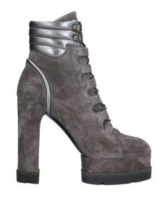 Полусапоги и высокие ботинки Casadei