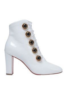 Полусапоги и высокие ботинки Christian Louboutin