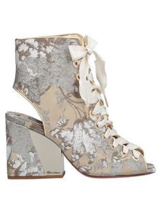 Полусапоги и высокие ботинки Santoni