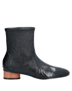 Полусапоги и высокие ботинки Stuart Weitzman