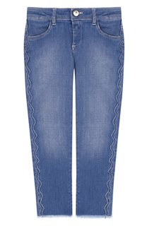 Джинсы с фигурной прострочкой и бахромой