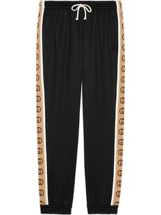 Gucci спортивные шорты с логотипами на лампасах
