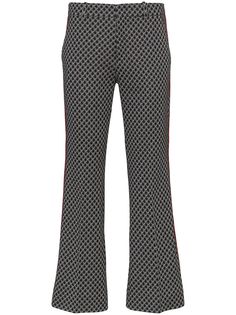 Gucci укороченные расклешенные брюки с принтом GG