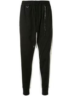 Mastermind World зауженные брюки с логотипами на лампасах