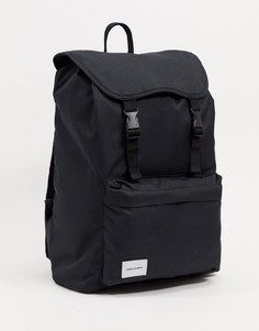 Черный рюкзак с белой фирменной нашивкой и двумя ремешками ASOS Unrvlld Supply