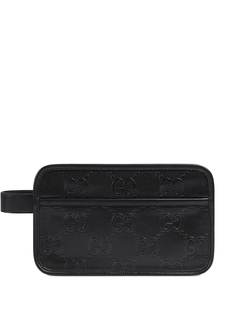 Gucci несессер с тисненым узором GG Supreme