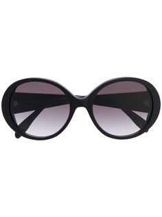 Alexander McQueen Eyewear солнцезащитные очки в круглой массивной оправе с логотипом