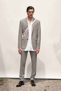 Базовые костюмные брюки из ткани с рельефным узором Zara