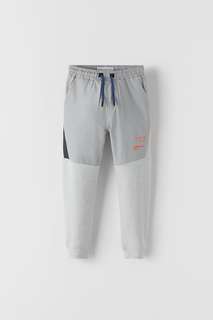 Спортивные брюки из пике и высокотехнологичной ткани Zara