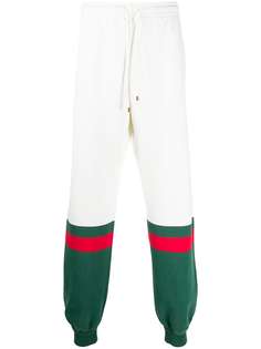 Gucci удлиненные спортивные брюки