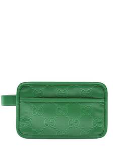 Gucci несессер с тисненым узором GG Supreme
