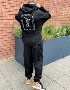 Черный спортивный костюм в стиле oversized с большим принтом на спине ASOS DESIGN