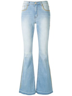 Amapô расклешенные джинсы с заклепками