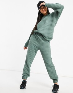 Стеганые спортивные брюки от комплекта цвета высветленного хаки ASOS DESIGN-Зеленый
