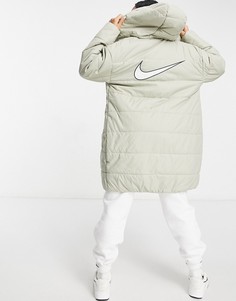 Светло-бежевый длинный пуховик с логотипом-галочкой на спине Nike-Белый