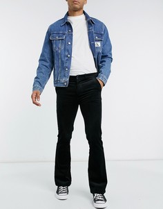 Черные вельветовые брюки клеш ASOS DESIGN-Черный
